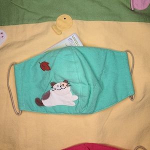 1 Adult Light Teal Embroidered Hikosen Cara Mask